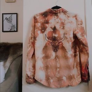 Bleach dye flannel with bull print on back